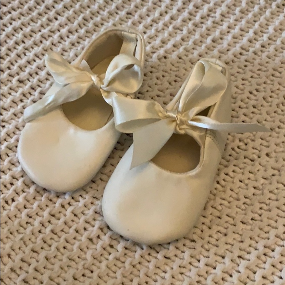 White ballet flats
